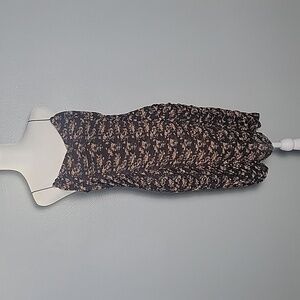 Mini bodycon floral dress with rusching